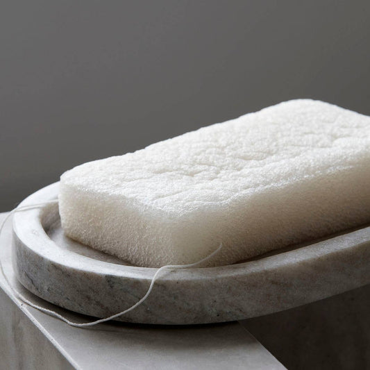 White Konjac Sponge on soap dish